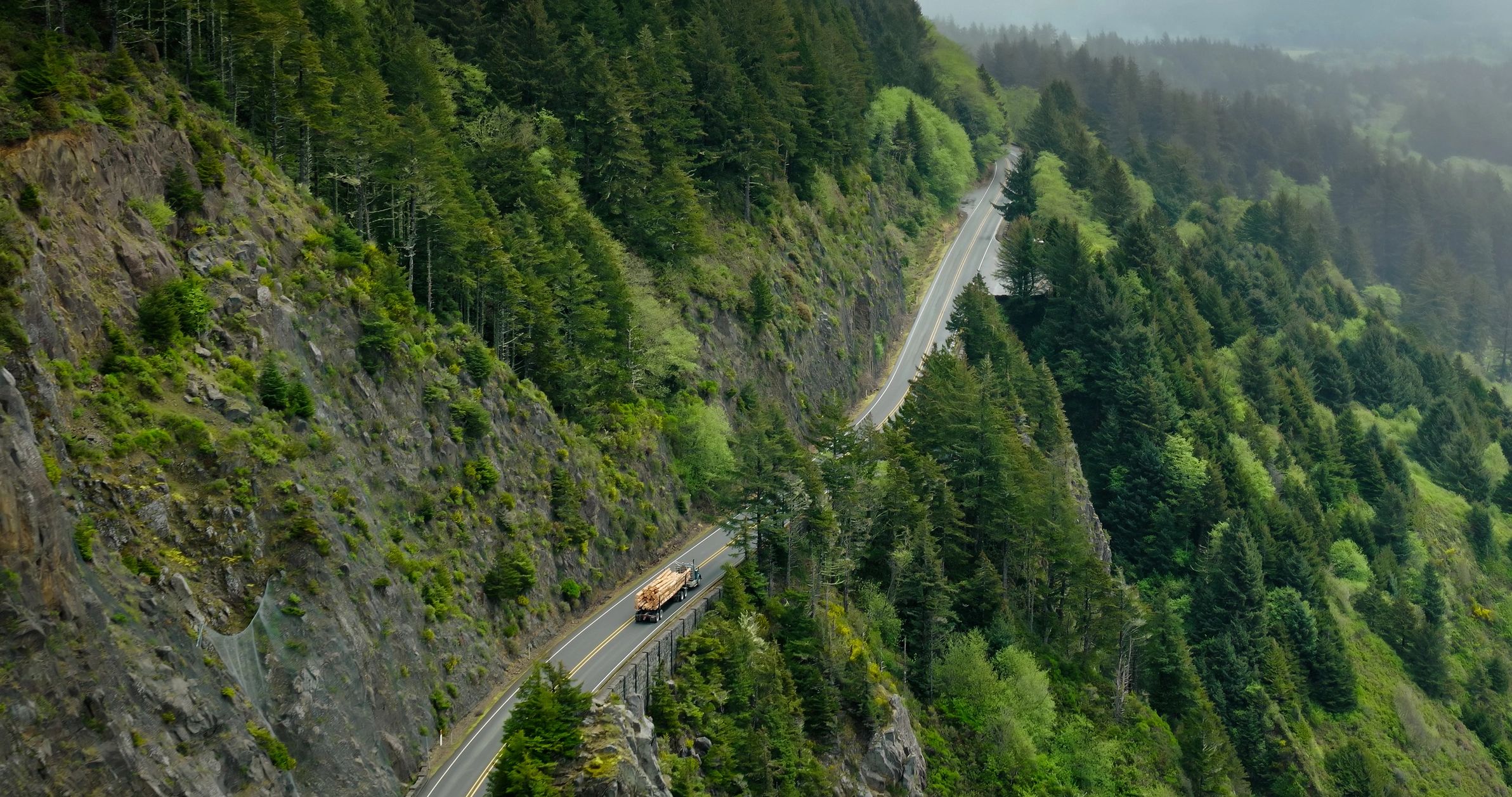Coastal mountain road and sea landscape